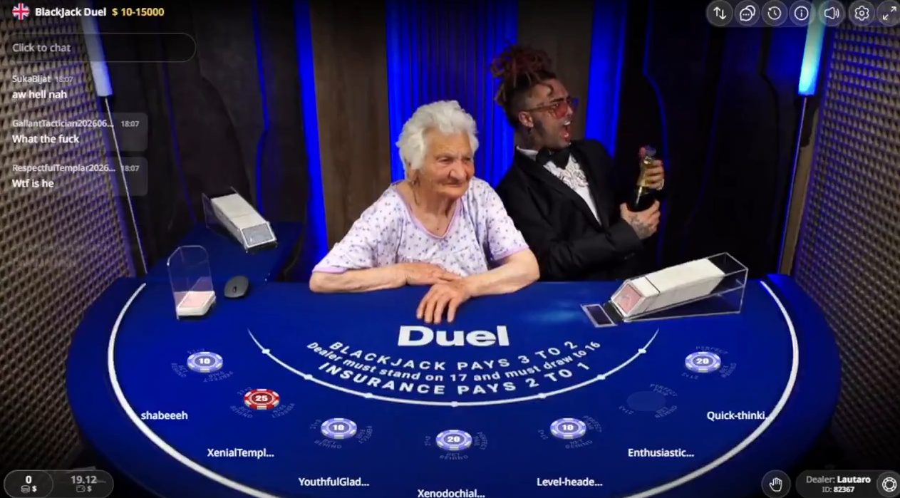 Elderly woman dealer at Duel Casino blackjack table with Lil Pump standing behind her holding champagne